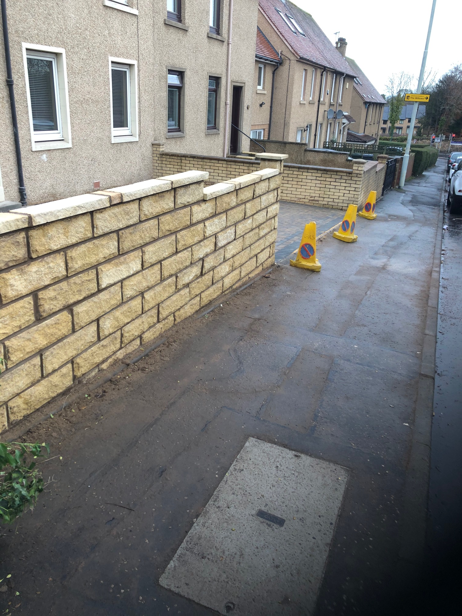 pavement with brick wall