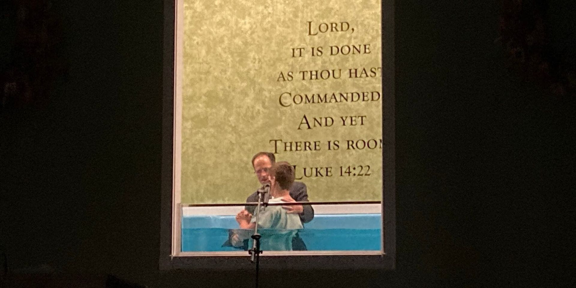 Pastor Roger conducting a baptism 