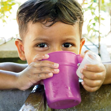 cross catholic outreach child