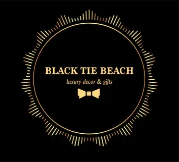 Gold circular logo on black background. Text reads "Black Tie Beach, luxury decor & gifts" with a bow tie icon.
