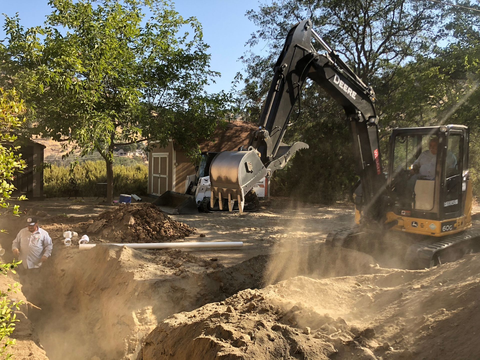 Big Bore Drilling Inc. crew preparing the site for a residential septic system construction project in Sanger, CA.