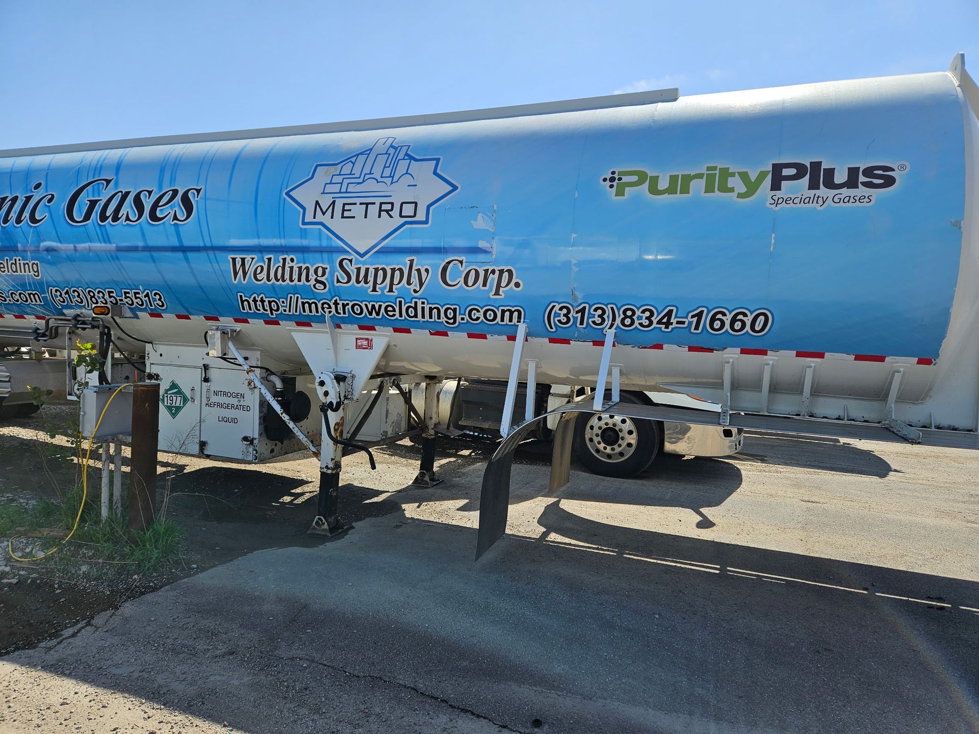 A Metro Welding Supply truck with the word cryogenic gases on it driven by our CDL A Drivers in Detroit, MI.