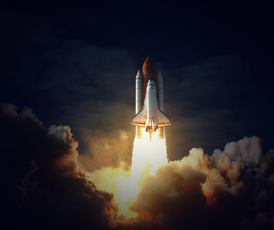 A space shuttle embarks on its journey, ascending powerfully against a dramatic backdrop of dark clouds and a sunlit sky. Its solid rocket boosters ignite, creating a brilliant trail of fire and smoke as it propels upwards. The shuttle's white and orange external tank contrasts with the surrounding darkness, symbolizing human ingenuity and the quest for exploration. The image captures the shuttle at a climactic moment of lift-off, emphasizing the power and energy of space travel.