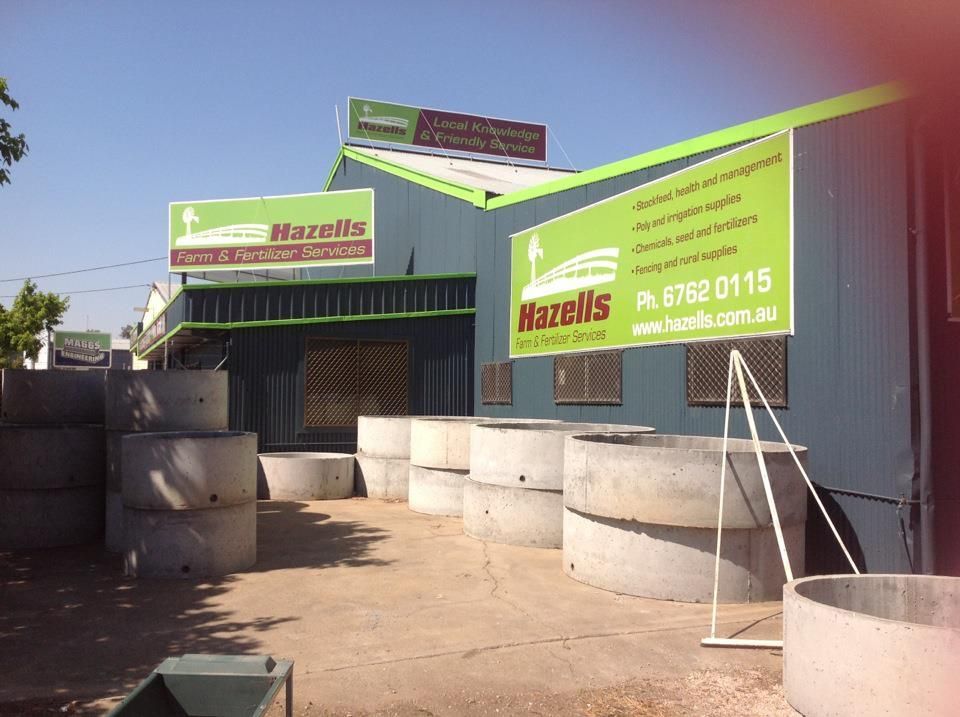 A Building with A Sign that Says Hazells on It — Hazells Farm & Fertilizer Services in Taminda, NSW