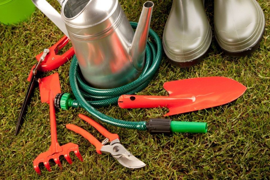 Gardening Tools on The Grass — Hazells Farm & Fertilizer Services in Taminda, NSW