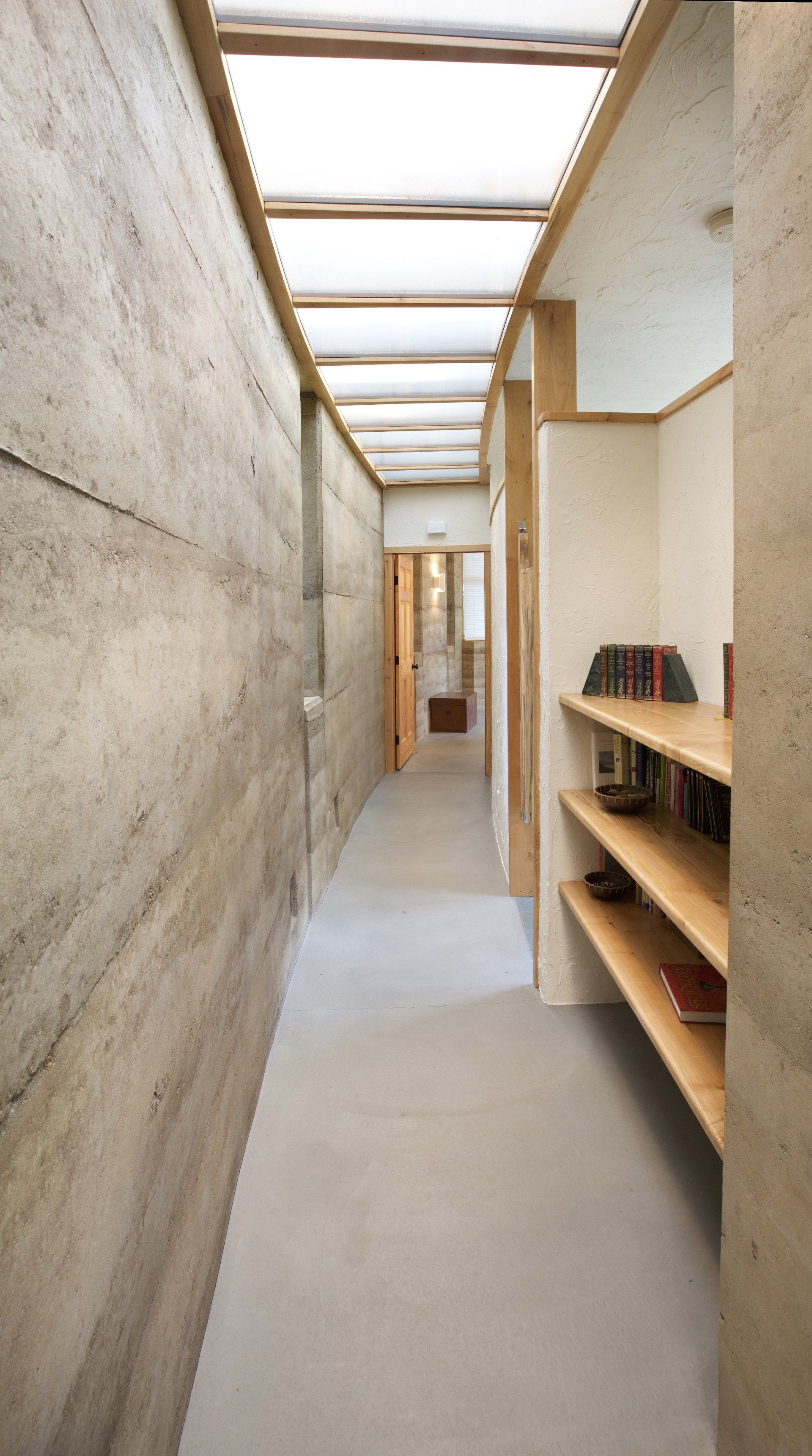 long hallway with a bookshelf and SIREWALLs