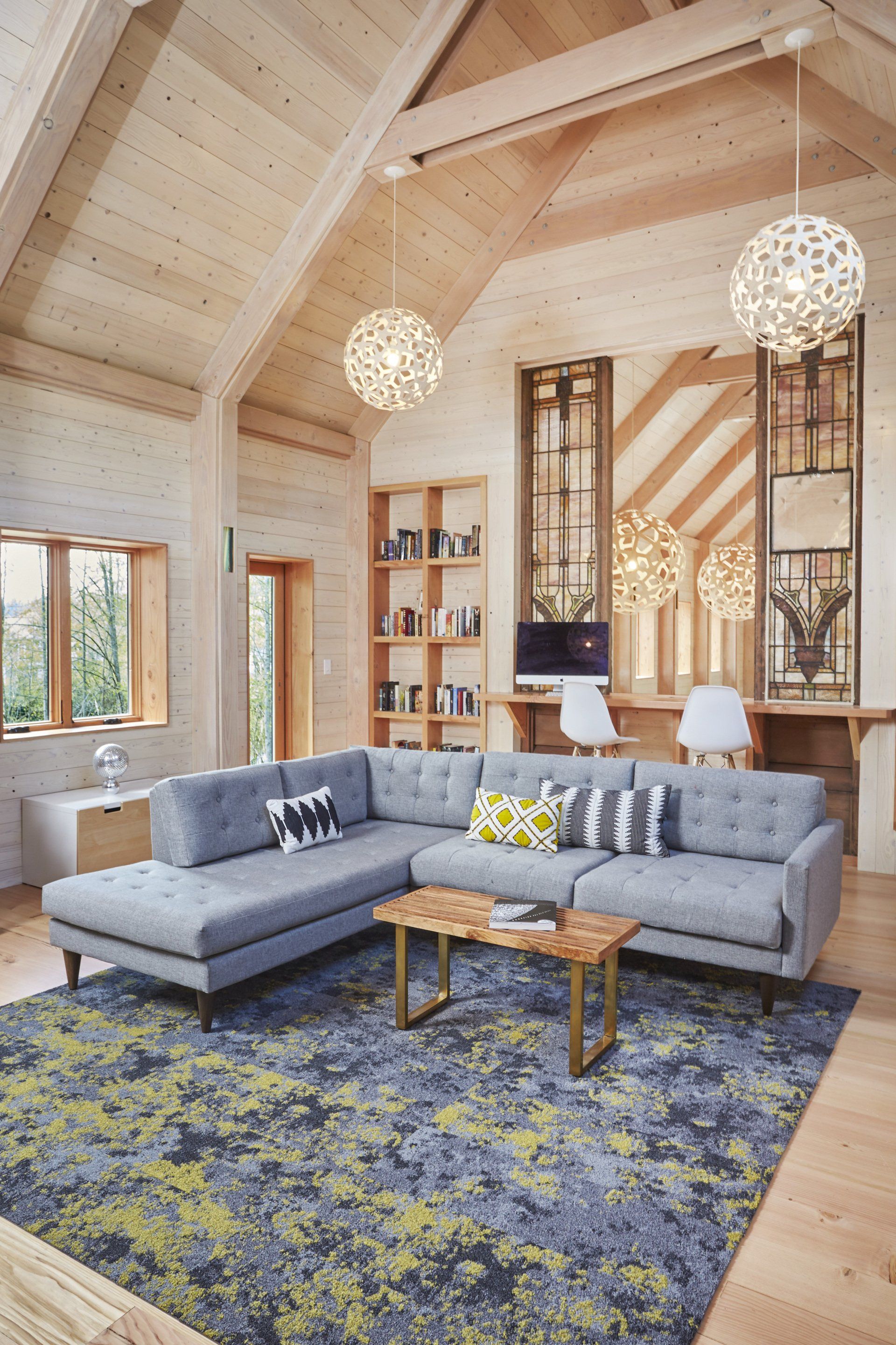 living room with high, wooden, cathedral ceiling