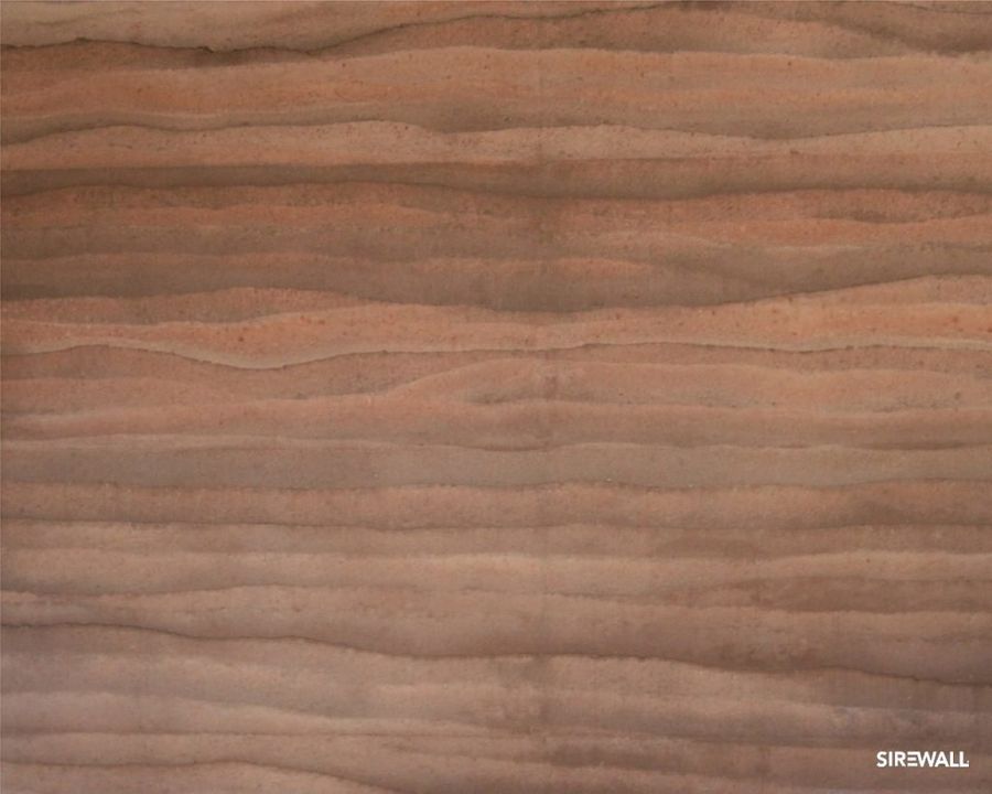 Close up of a SIREWALL rammed earth wall with beautiful layers of rammed earth with slightly varying colors