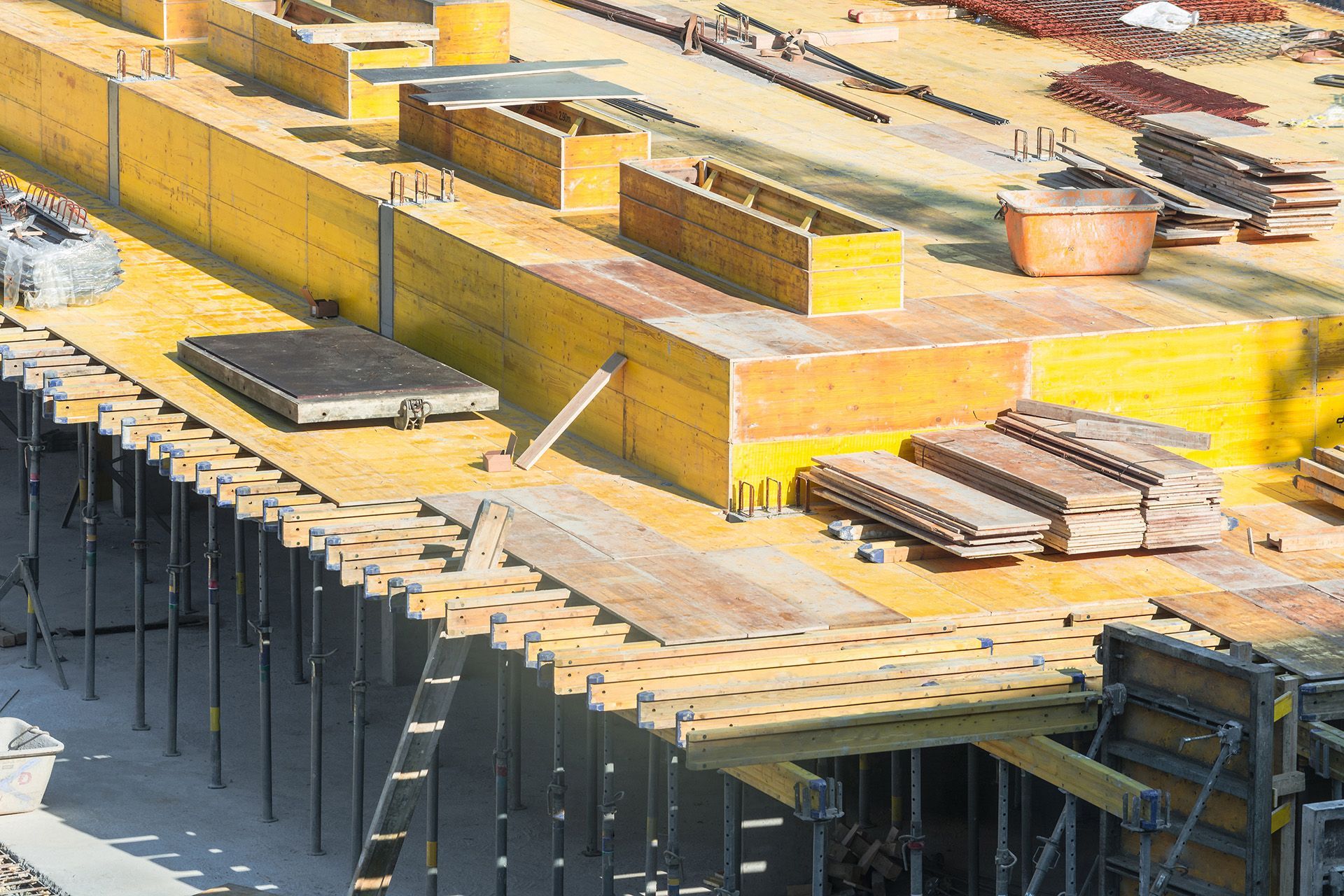 a construction site with a lot of wooden scaffolding