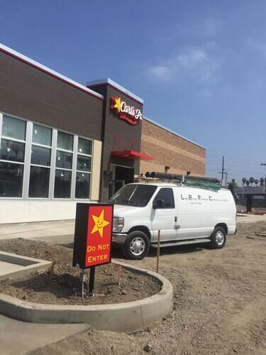 Van in Front Store — Long Beach, CA — Long Beach Plumbing Company