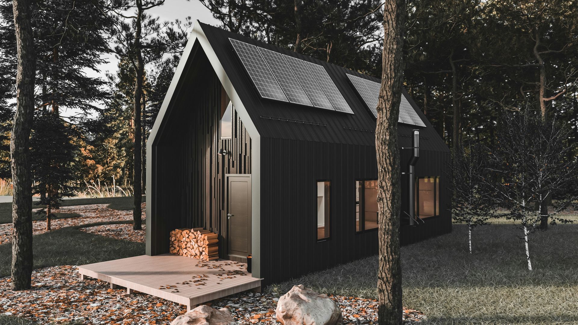 A small black house is sitting in the middle of a forest.