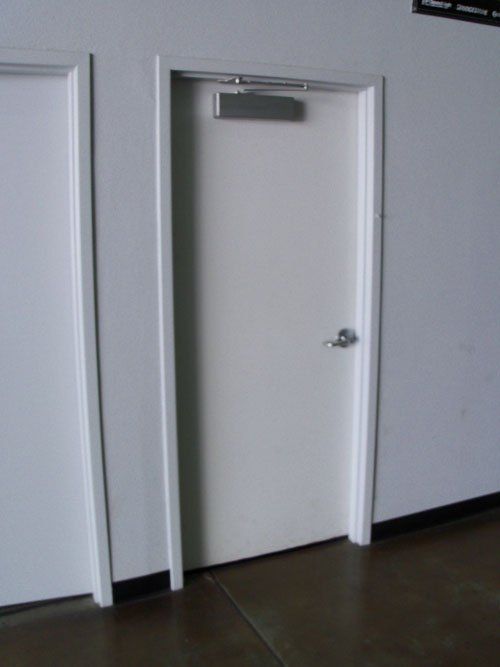 Hollow Metal Doors — White Door in Clovis, CA