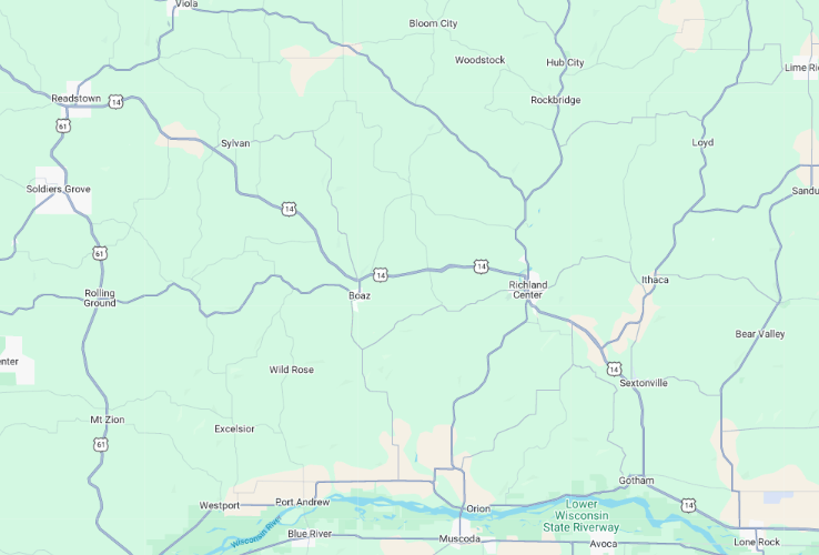 A digital map showing roads and towns in a rural area, with major routes labeled and water features in light blue.