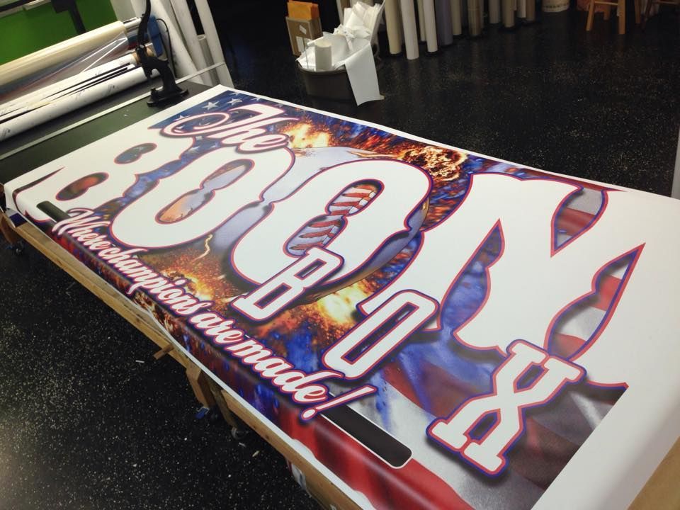 A large sign that says the boom box on it