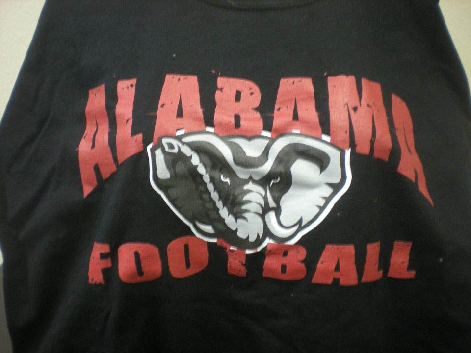 A black shirt with alabama football written on it