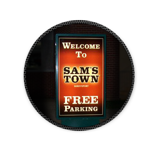 A sign that says welcome to sam 's town free parking