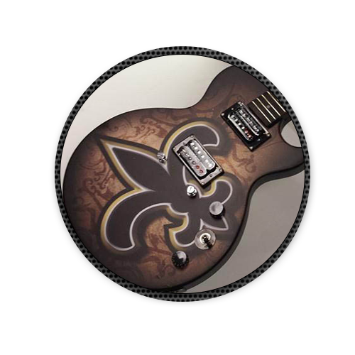 A guitar with a fleur de lis design on it