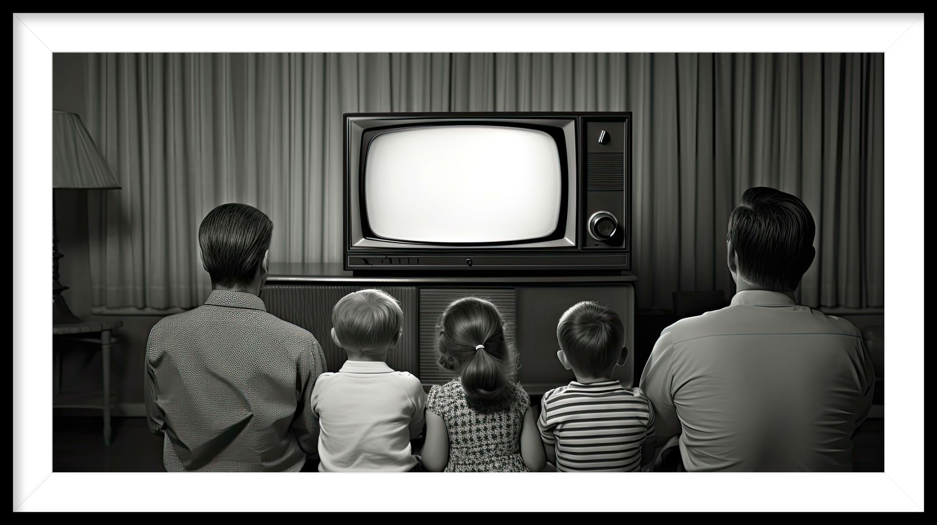 A black and white photo of a family sitting in front of a television.