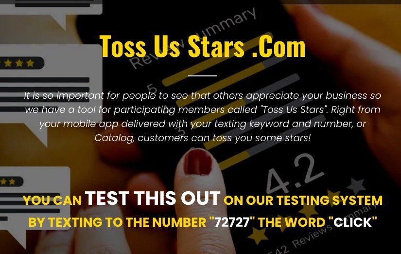 A person is holding a cell phone with the website toss us stars.com on it