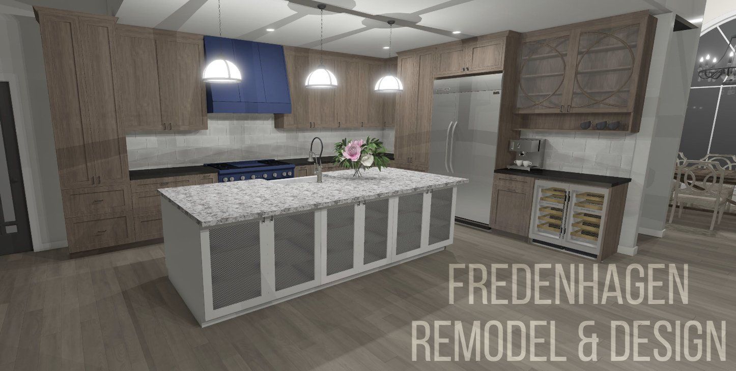 A kitchen with a large island in the middle of it.