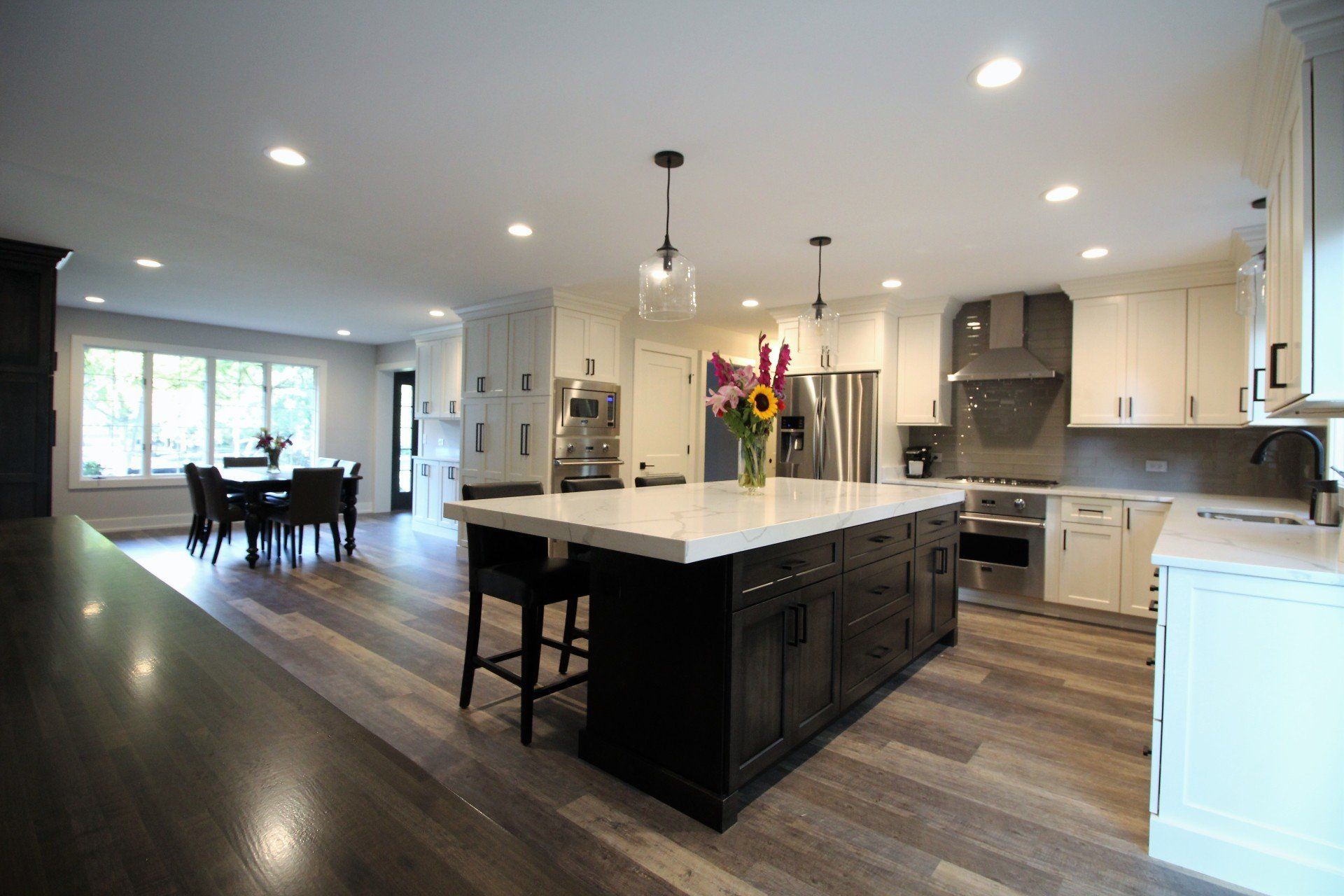 There is a large island in the middle of the kitchen.