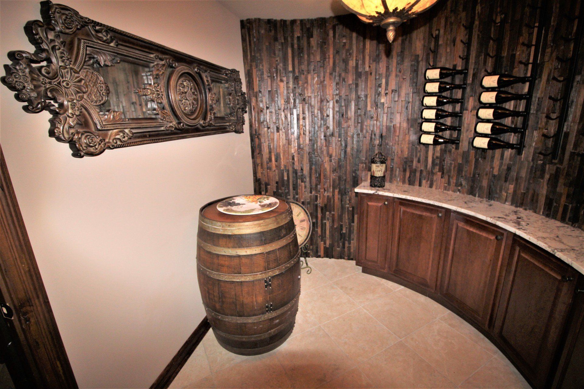 A wine cellar with a wooden wall and a wooden barrel