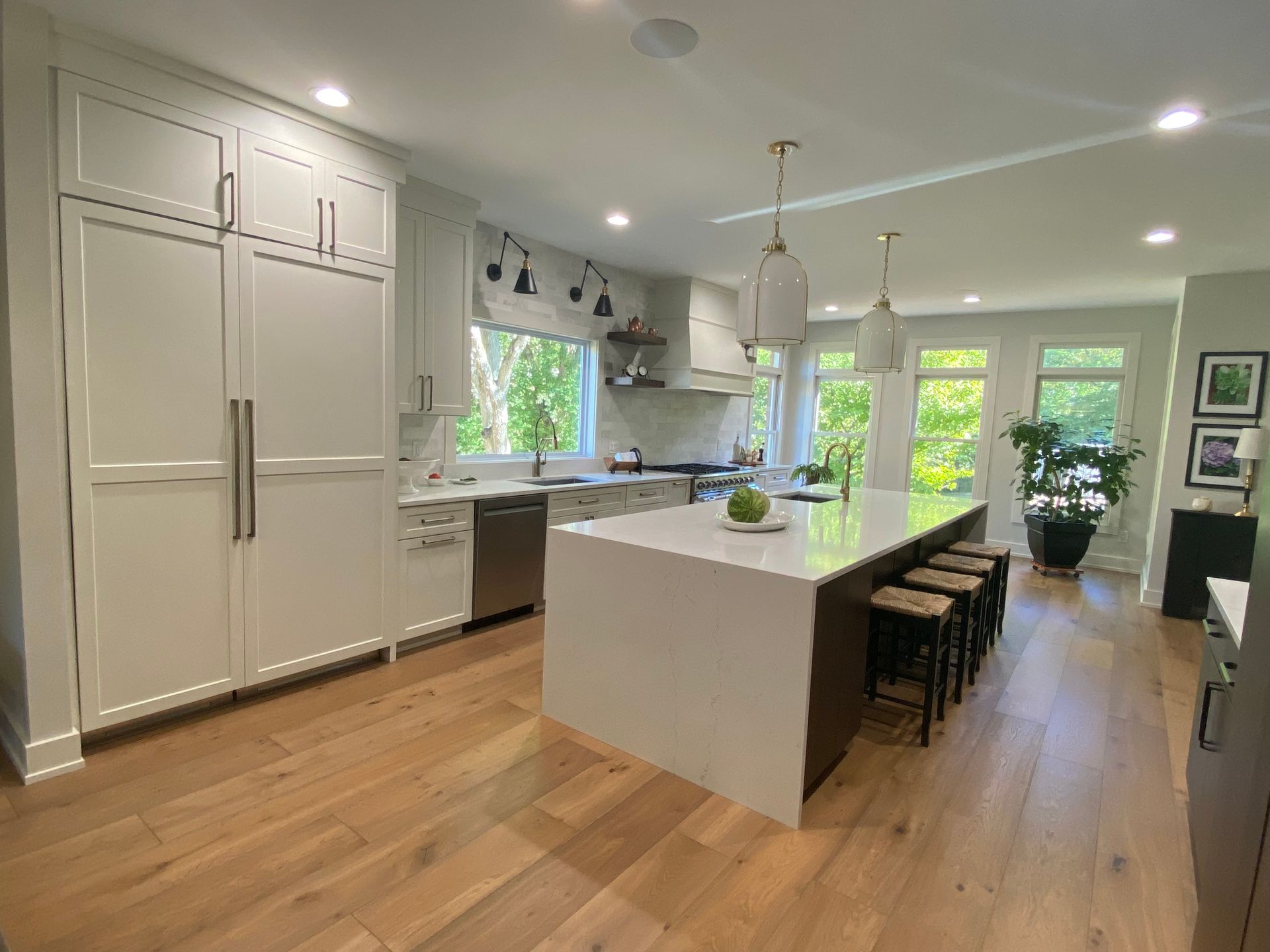 There is a large island in the middle of the kitchen.