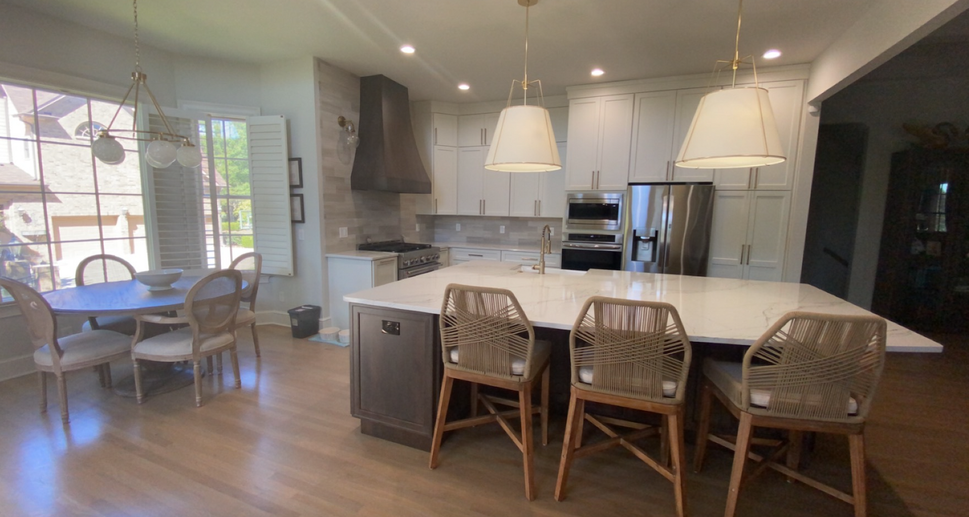 There is a large island in the middle of the kitchen.