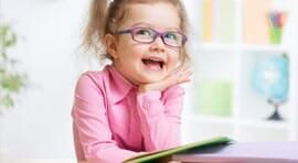 Little girl with eyeglass — Optometry Clinic in Colorado Springs, CO