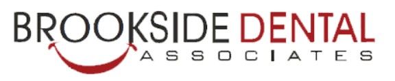 A logo for brookside dental associates with a red smile