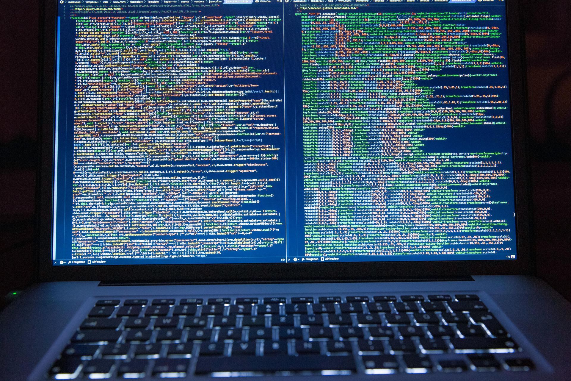 A laptop is open to a screen with a lot of text on it