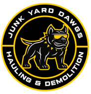 A logo for junk yard dawgs hauling and demolition llc