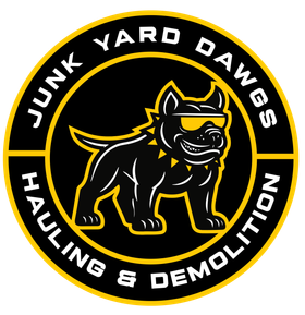 A logo for junk yard dawgs hauling and demolition llc