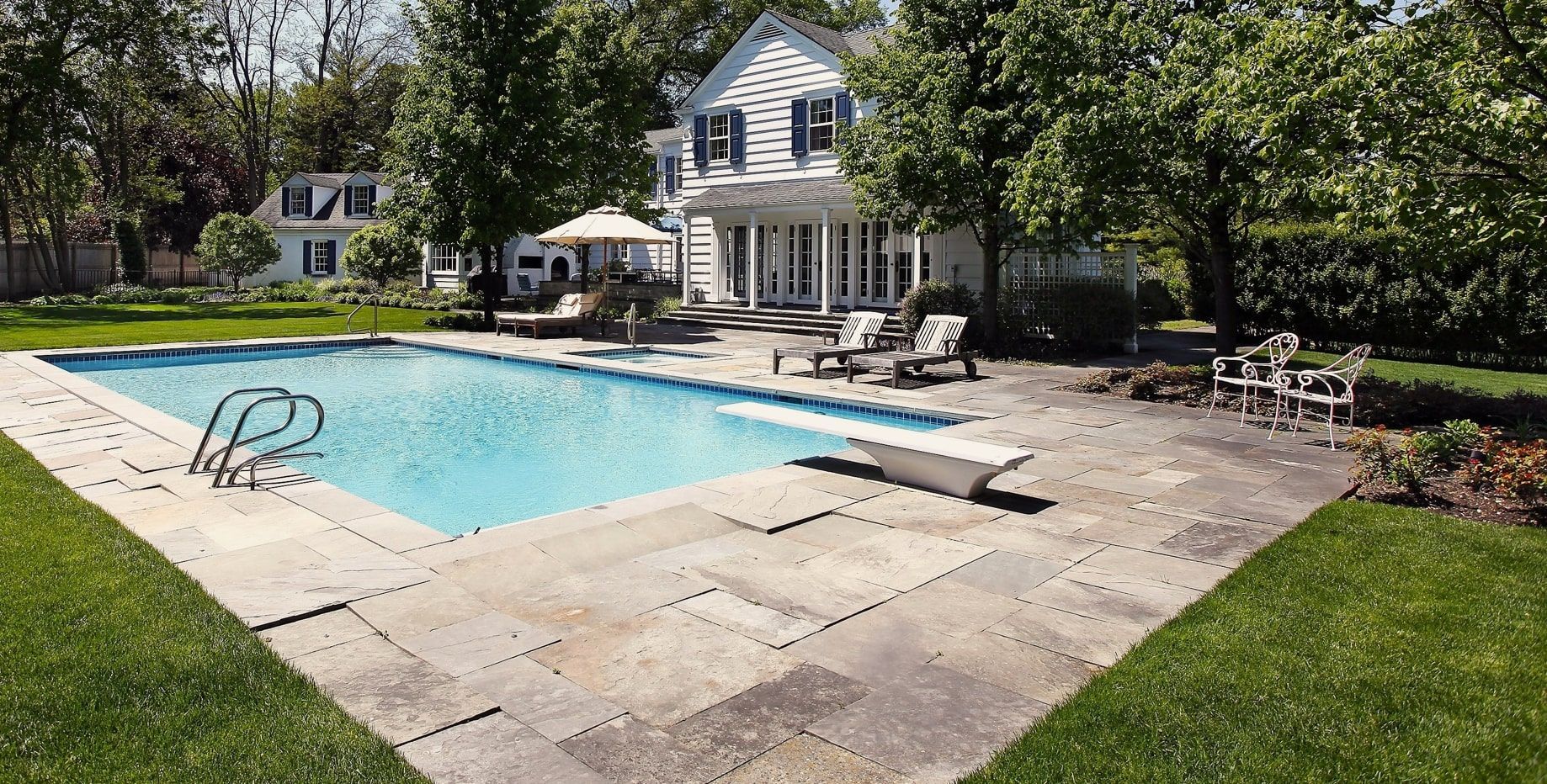 Concrete pool deck renovation in Holland residential area
