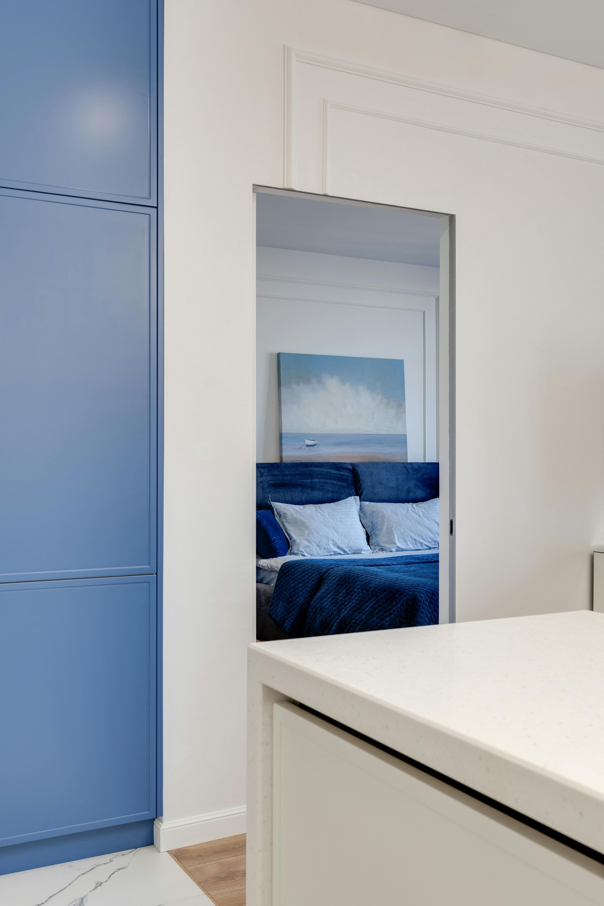 An empty room with a ladder in the middle of it.