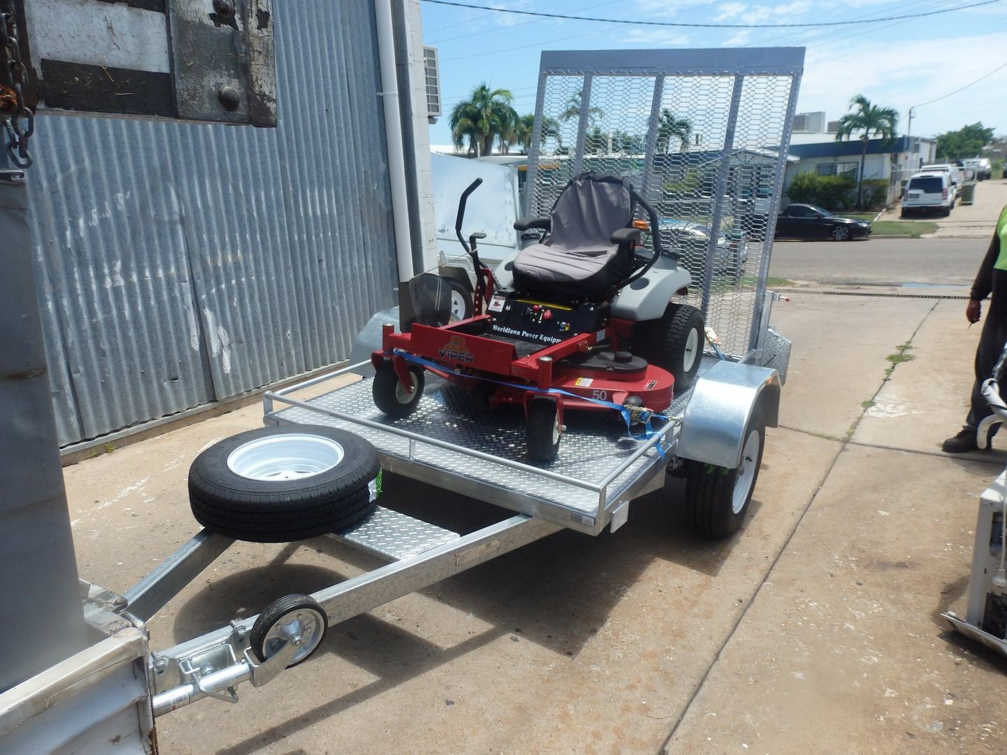 Trailer with Mower — Budget Trailers in Garbutt, QLD