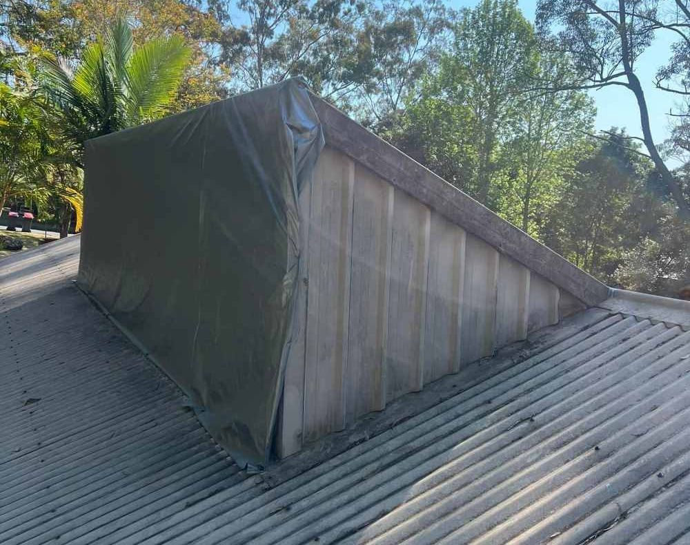 A Damaged Structure on Top of a Metal Roof — Richmond River Roofing Pty Ltd in Northern Rivers, NSW