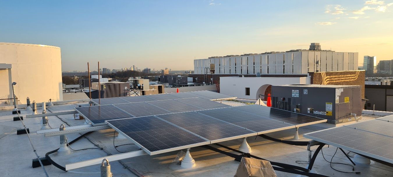 Rooftop solar panels on a building.