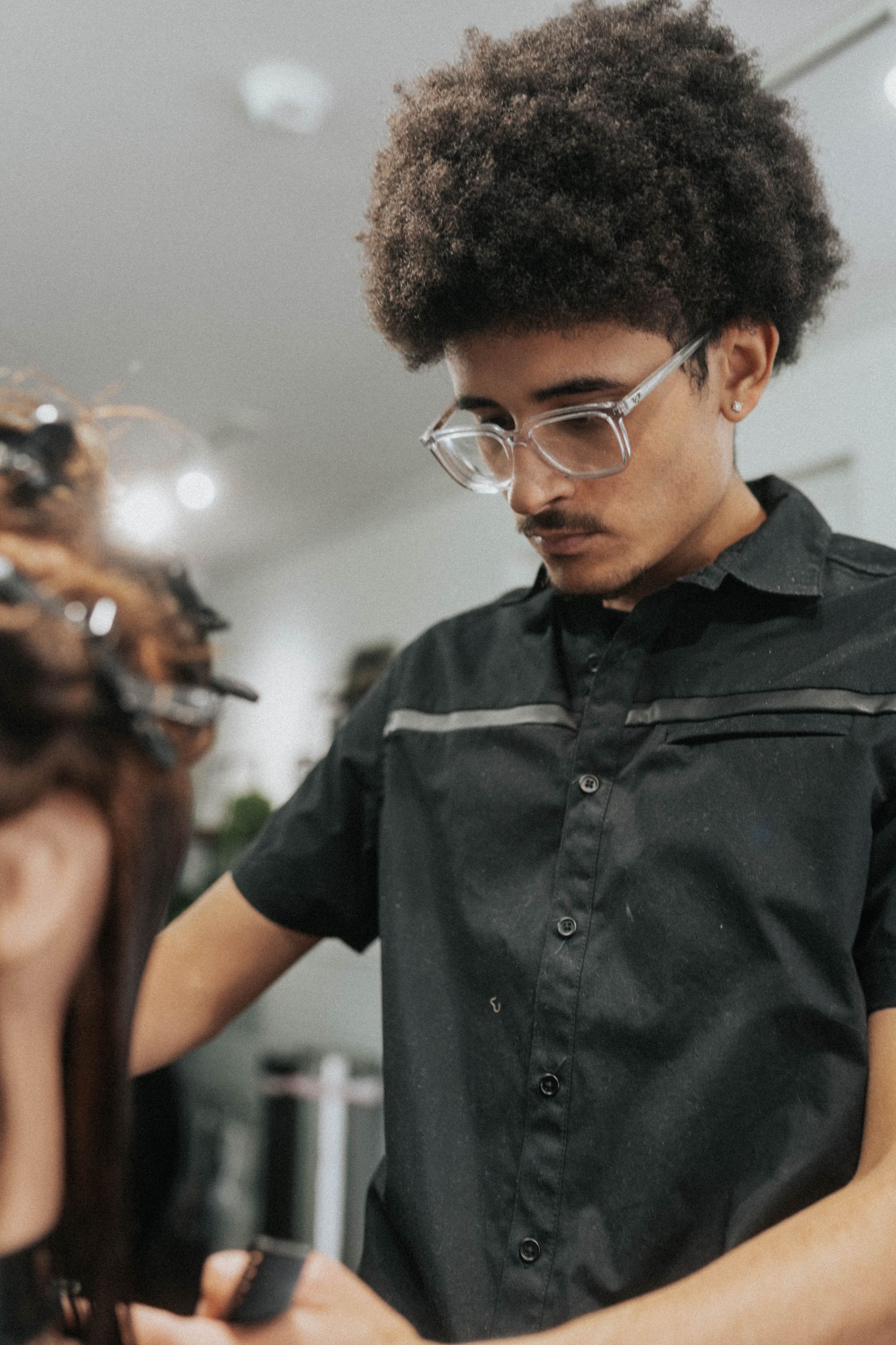 Client getting a clean fade and beard lineup at Modern Man Barber Studio in Long Branch, NJ for a sharp, confident finish.