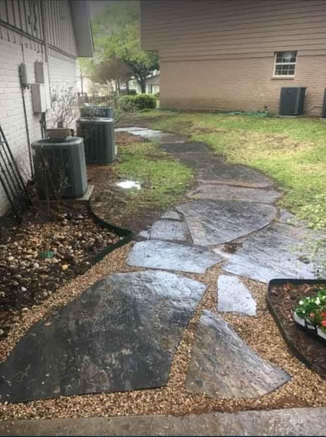 A Stone Walkway leading to a House in a Backyard - Tulsa, OK - Outdoor Orchestrators