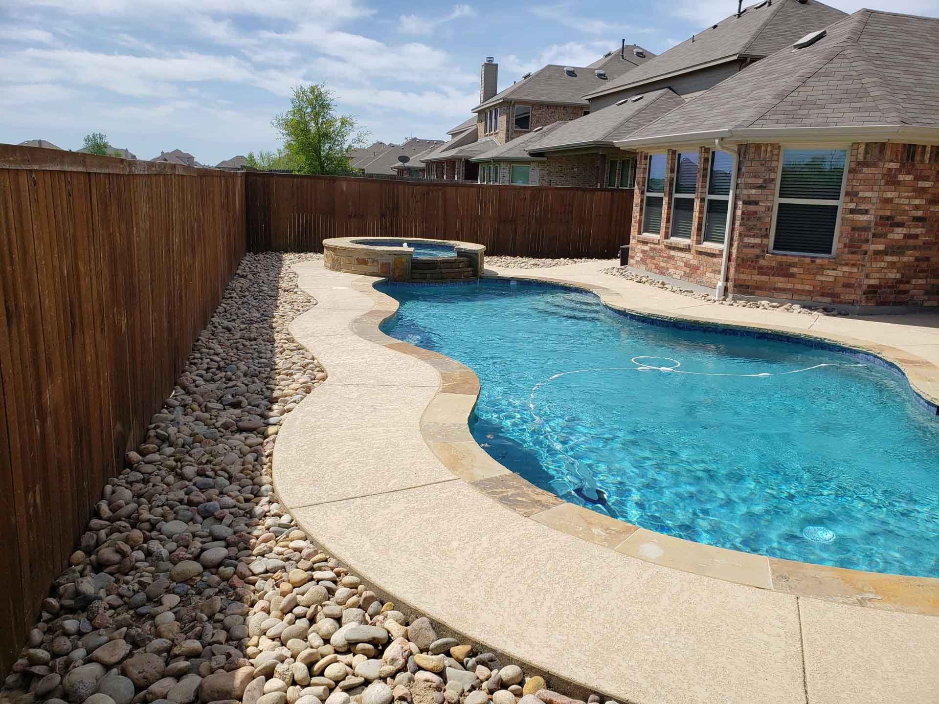 A large Swimming Pool on a Backyard - Tulsa, OK - Outdoor Orchestrators
