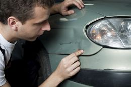 mechanic working on smash repair