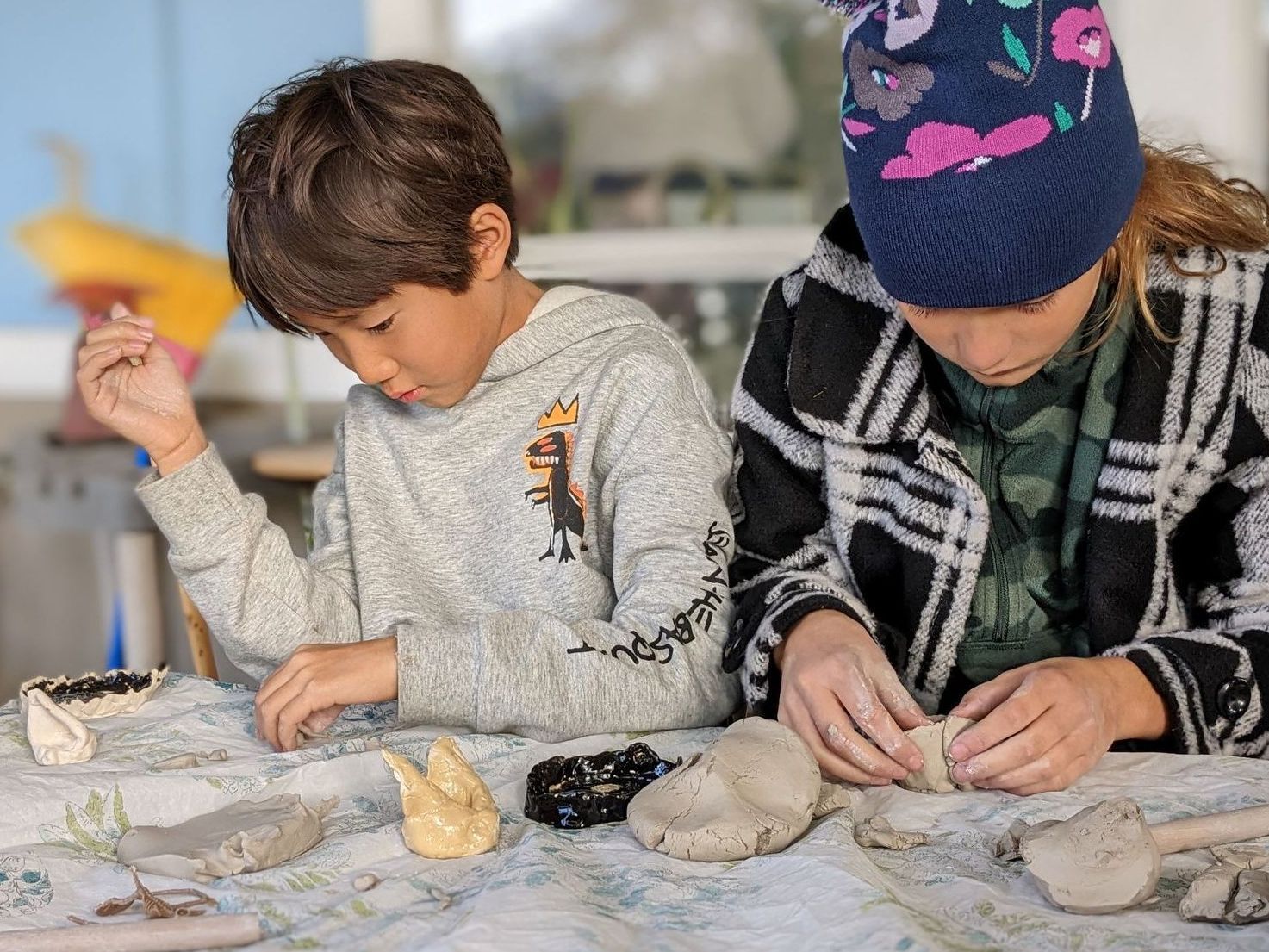 Montessori children working with clay
