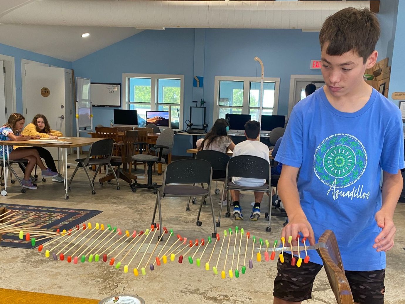 A boy working with Montessori materials