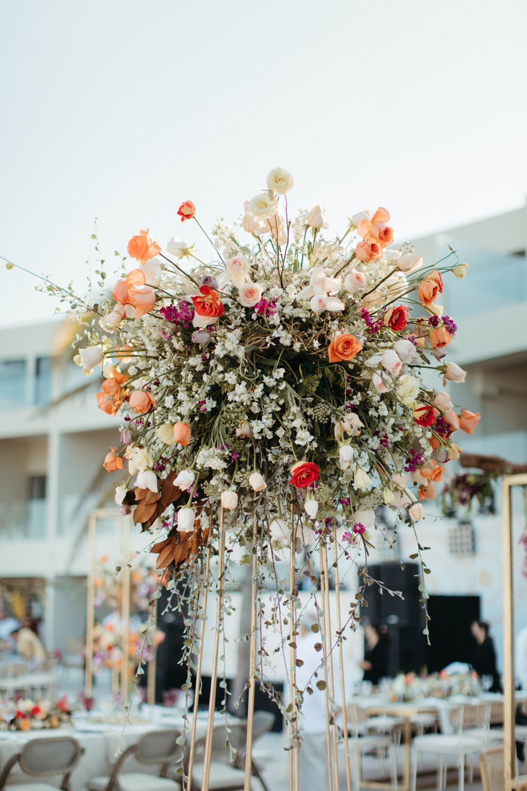 A large bouquet of flowers is sitting on top of a table.
