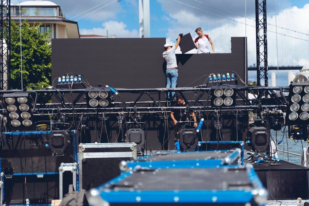 Stage Being Set Up Outdoors — Big Electrics in Redlynch, QLD