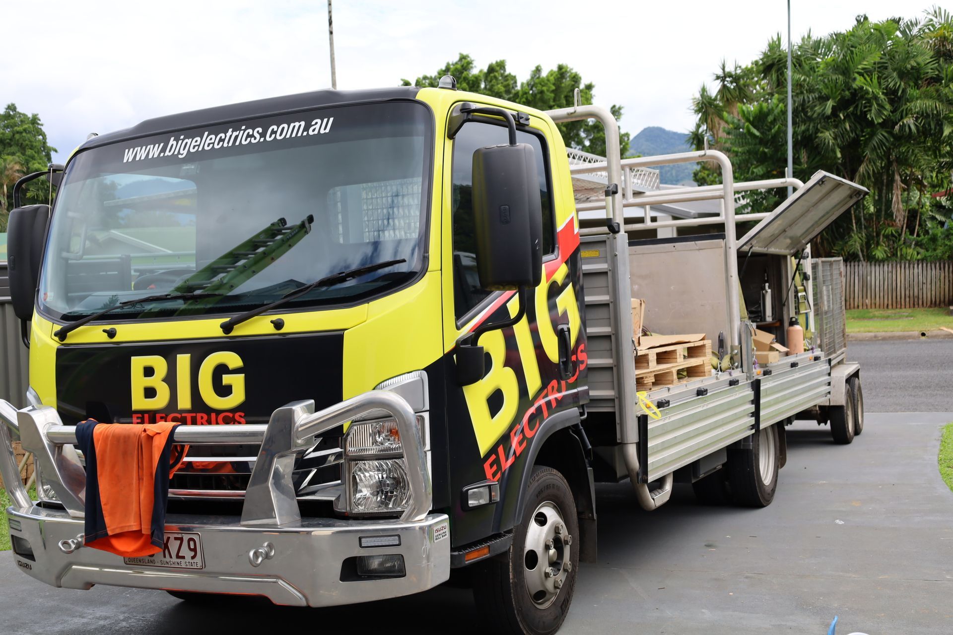 White Air Conditioning Unit Mounted on a Wall — Big Electrics in Redlynch, QLD