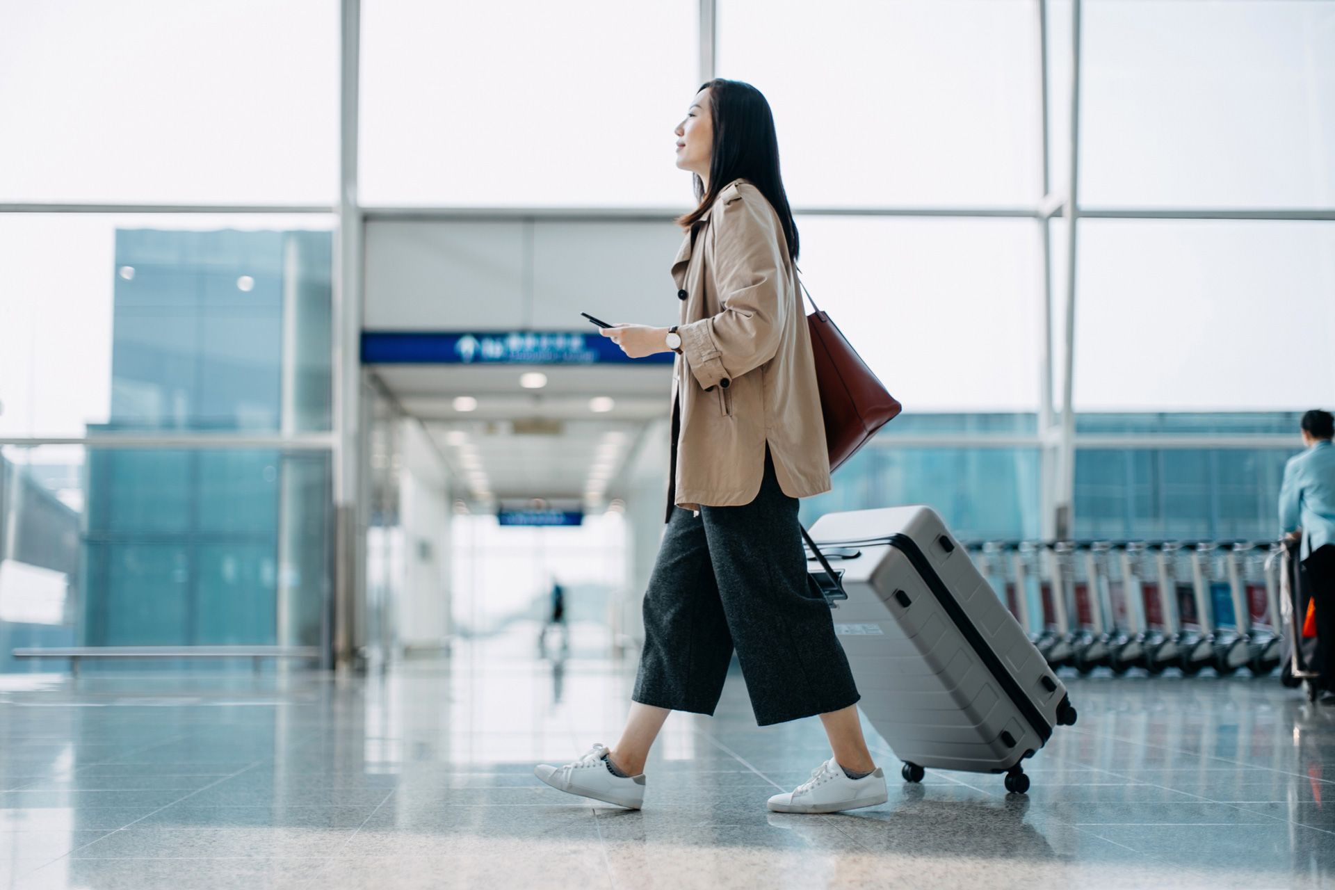 Woman on Airport — Adelaide, SA — Century Ocean
