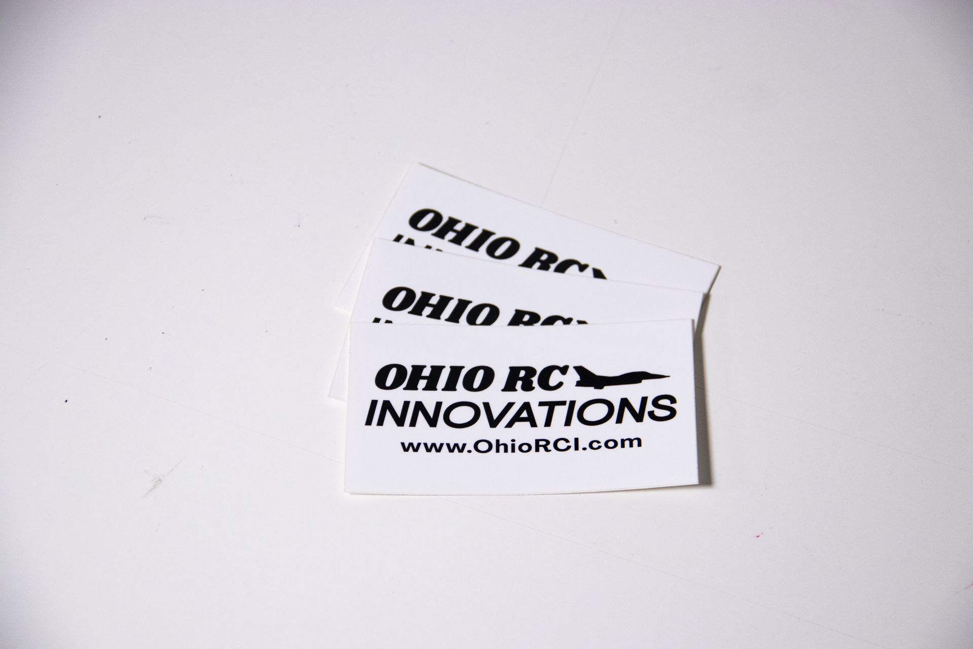 Two ohio rc innovations stickers on a white surface
