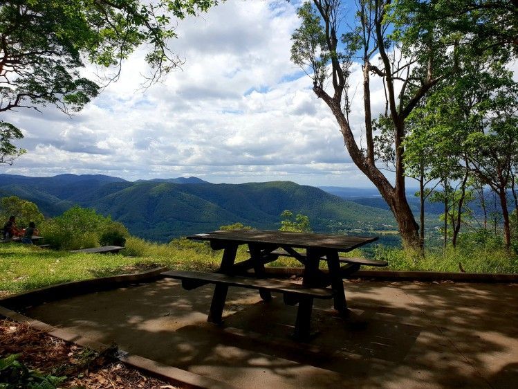 A Picnic Table With A View Of Mountains In The Background — Surelift Crane Hire In Nebo, QLD